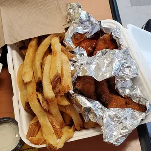 Half Old Bay Dry Rub Half Hot Buffalo wings and fries