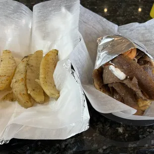 Greek potatoes and Gyro Sandwich.