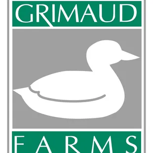 a duck on a farm sign