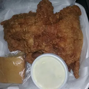 This is a two-piece &quot;snack&quot; box. Srsly. $5.90 plus tax for two chicken breasts bigger than Dolly Parton, one side and a roll or cornbread.