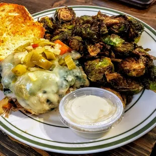 Pork Giardiniera Sandwich with Butter Brown Brussels Sprouts at Grind