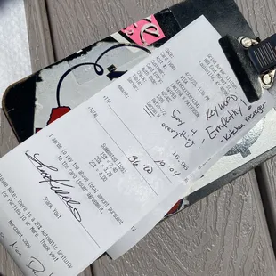 a receipt on a skateboard