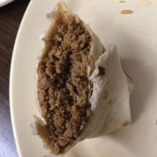 That's a combination burrito... plain and uninteresting. It's very salty... same with the beans.