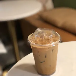 &quot;White widow&quot; signature CBD iced latte with brown sugar and white mocha