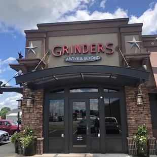 he entrance to grinders above &amp; beyond