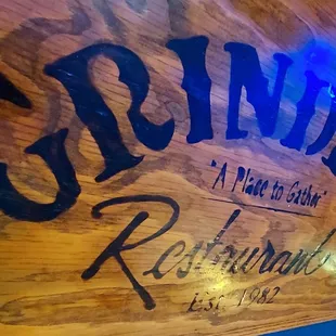 Grinder&apos;s logo on table