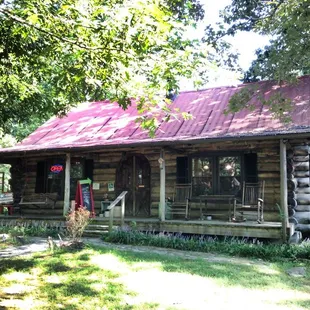 Our hand built log cabin tasting room!