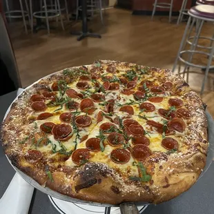 Pepperoni pizza. Excellent crispy Parmesan crust, super flavorful sauce and basil. Thanks!