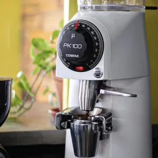 a cup of coffee and a blender