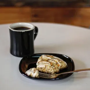 a slice of cake and a cup of coffee