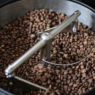 coffee beans in a metal bowl