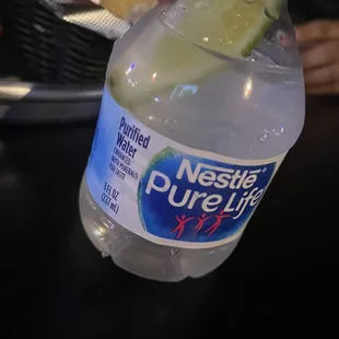 The bottle of water.