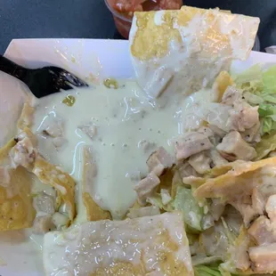 Nachos few chips dunk in way too much runny cheese.