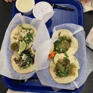 Tacos-carne azado, pollo azado, vegetarian taco with cactus.