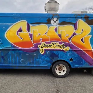 graffiti on the side of the truck
