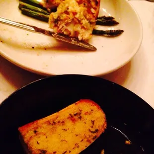 House special Snapper with lobster and shrimp over served on a bed of asparagus.