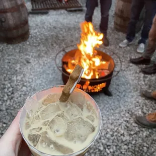 Enjoying my White Russian by the fire
