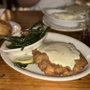 Chicken fried steak, Gruene beans, country gravy and onion rings.  Amazing!