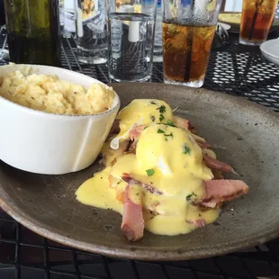 Eggs Benedict with a side of grits