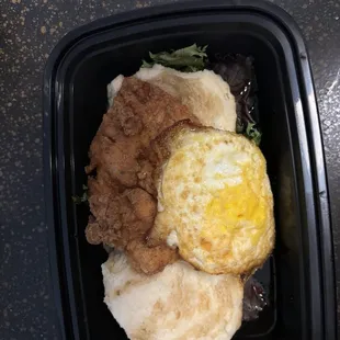 Southern fried chicken with honey biscuit and egg