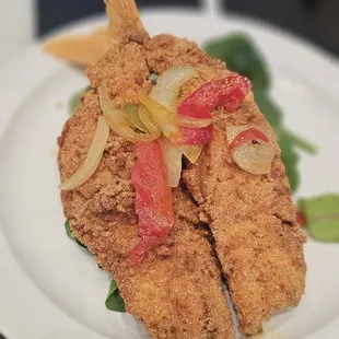 A side of fried Red Snapper.