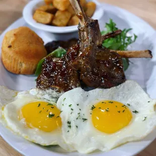 Lamb chops egg sunny side up and breakfast potatoes