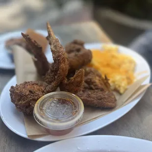 Chicken wings and scrambled eggs