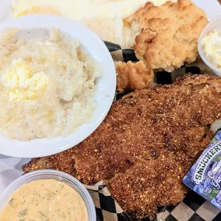 Fried Catfish with your choice of Bread (I went with biscuit) 2 eggs your style and a side (here buttered grits)