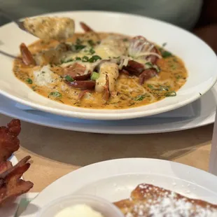 Uptown Shrimp N&apos; Grits with a side of French toast