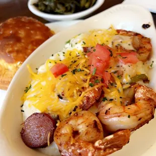 a plate of grits and shrimp