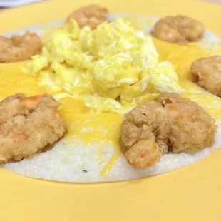 a plate of grits and eggs
