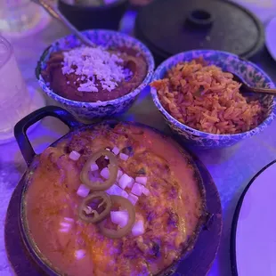 Enchilada and beans and rice and a broken handle