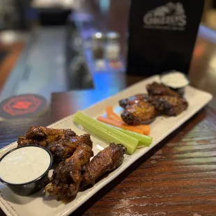Wood fired wings - half with the Buffalo rub and the other with Thai chili sauce. The blue cheese dressing was made in house - delicious!