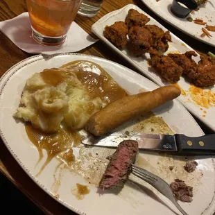 Sirloin mashed potatoes bread stick and old fashioned