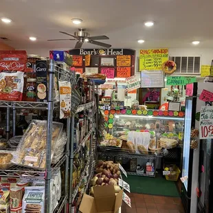 Delightful deli counter in the back with a great selection of sandwiches, meats, and cheeses