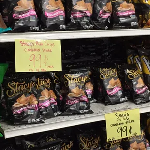 a shelf of snacks for sale