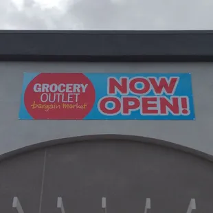 a stop sign on the side of a building