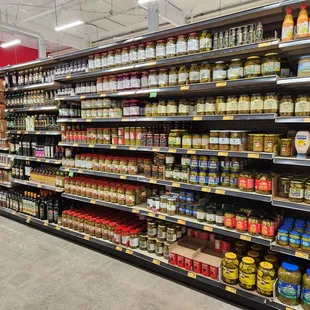 Shelves still organized nicely and lots of olives and other condiments 12-18-23
