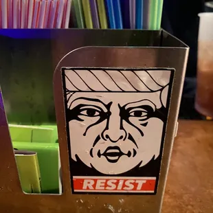 a close up of a sticker of a person&apos;s face