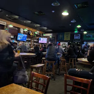 people sitting at the bar