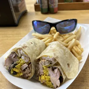 Chork burrito and fries... at the beach..