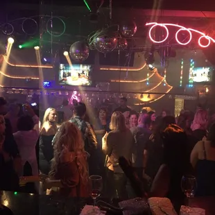 a crowd of people at a nightclub