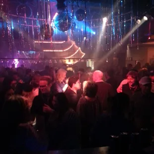 a crowd of people at a nightclub