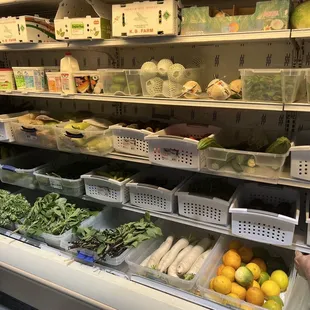 a display of vegetables in a grocery store