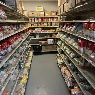 a grocery store aisle filled with food