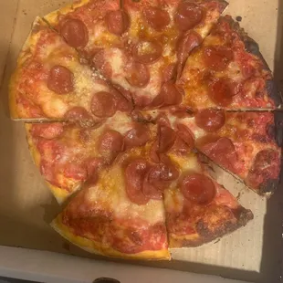Pieced together pepperoni pizza