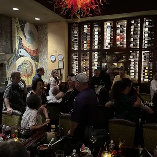 a group of people in a restaurant