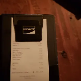 Receipt,  very reasonable for the atmosphere and quality of food. Also service is incredible.