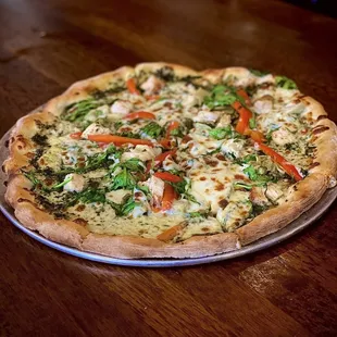 Pesto artichoke pizza with chicken