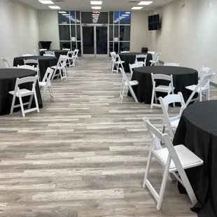 We include tables, chairs, and with certain packages black linen too with your rental.